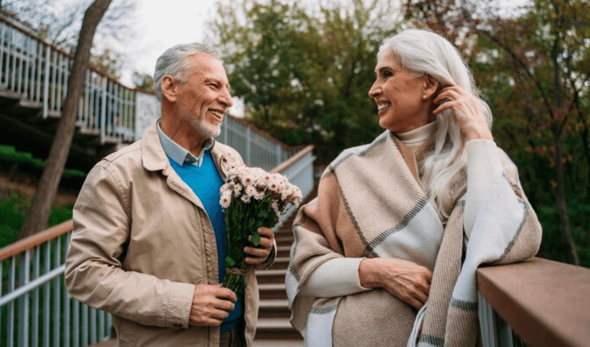 Mature couple out together near a familiar local neighborhood